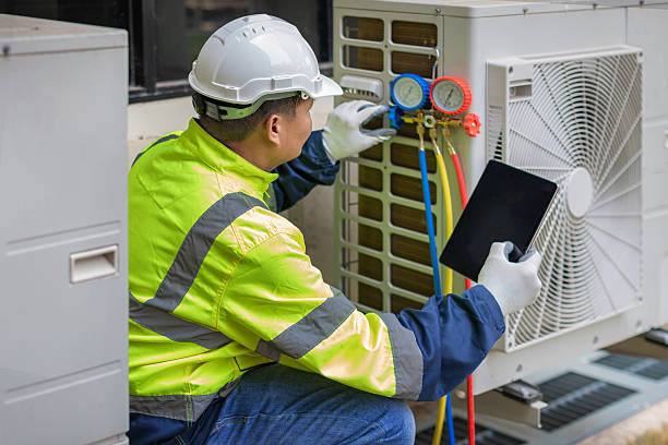 Professional Air Conditioning Repair technician working in Wasco, IL